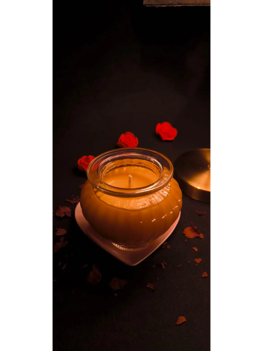 Luxury jar candle "The Scent of Millions" by MadyCandleEmporium on a wooden table.